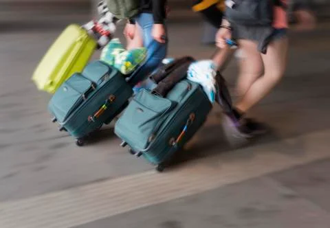 People with suitcases Stock Photos