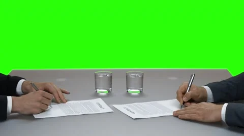 People in suits signing documents. Stock Footage