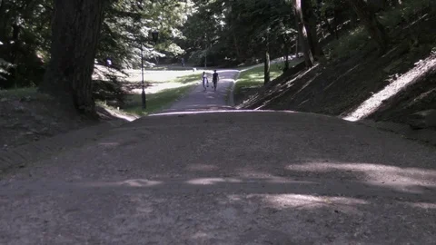 People in summer park at daylight Stock Footage 124804312