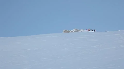 People on the summit of big mountain Stock Footage 46143547