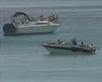 People sunbathing and relaxing on stationary yachts SD Footage