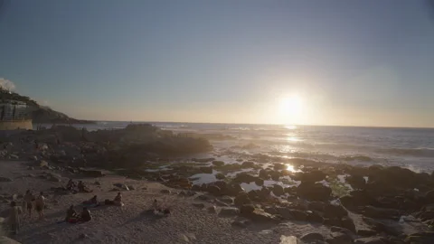People Sunbathing at Saunders Rock Beach in Seapoint, Cape Town | Rec. 709 Stock Footage 308464613