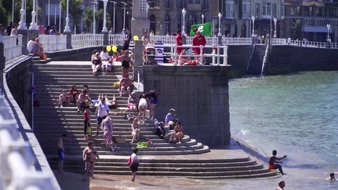 People sunbathing on the seeside in Spain Video stock 69947141