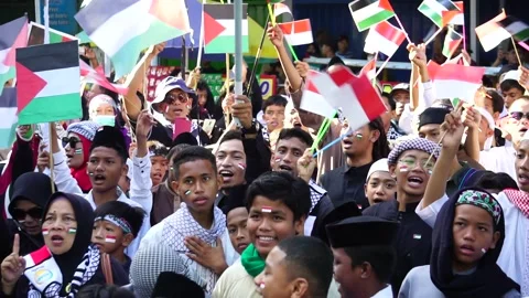 People support Palestine "Stop Genocidal War Crimes Cease Fire" Stock Footage 259677115