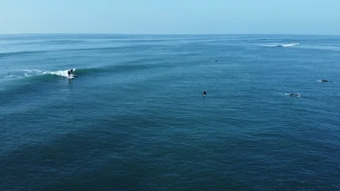 People surfing at Sunset cliffs in San Diego, California Stock Footage 233428525