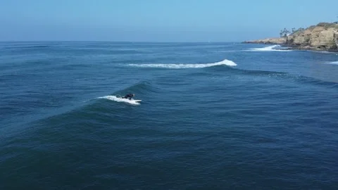People surfing at Sunset cliffs in San Diego, California Stock Footage 233428569