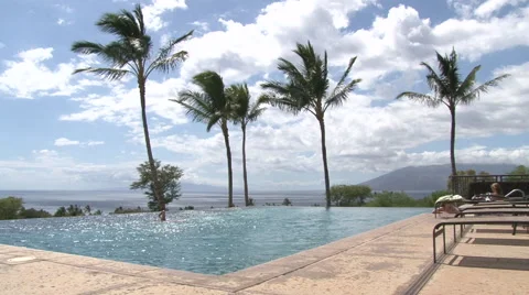 People Swimming In Infinity Pool Stock Footage 63612931