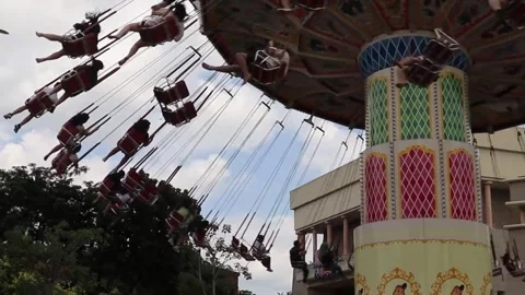 People on the swing ride 動画素材 245375692