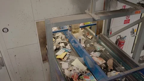 People in systematic sorting and categorization of waste materials, Stock Footage 255015917