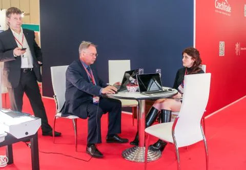 People at the table with laptops. Stock Photos