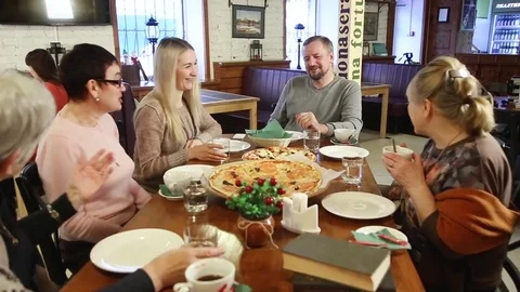 People at the tables in the cafe Stock Footage 84083257