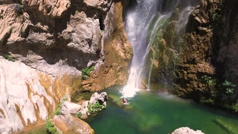 People take a bath under a waterfall during summer aerial drone view Stock-Footage 279569073