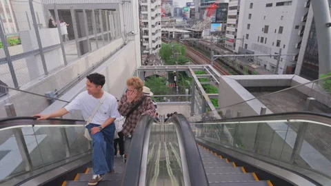 People take elevator to go up and down at the Miyashita Park in Shibuya Tokyo Stock Footage 282670454