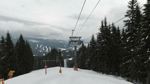 People take the elevator to the top station of the ski slope. Stock Footage 219004470