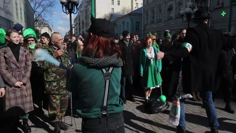 People take part of the St. Patrick's Day Parade 스톡 동영상 150705305