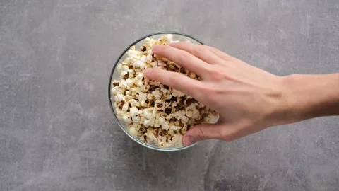 People take popcorn  Stock Footage 169238731