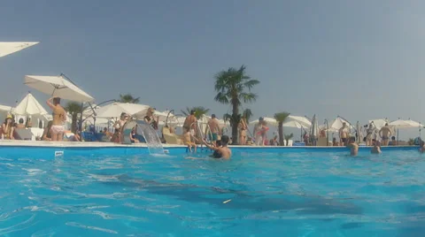 People take  a rest in the pool Stock Footage 32283017
