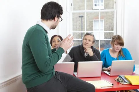 People taking computer class together Stock Photos