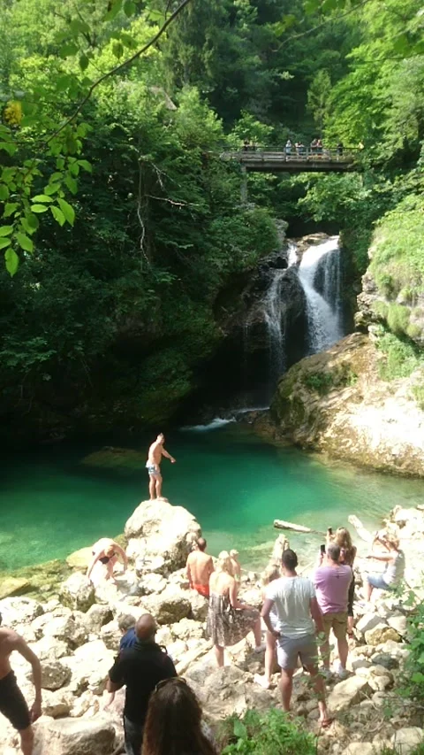 People taking a dive in the clear water of Vintgar Gorge in Slovenia Stock Footage 139506706