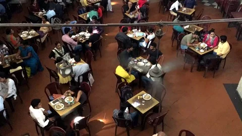 People taking lunch and making conversations inside coffee house Stock Footage 88243381