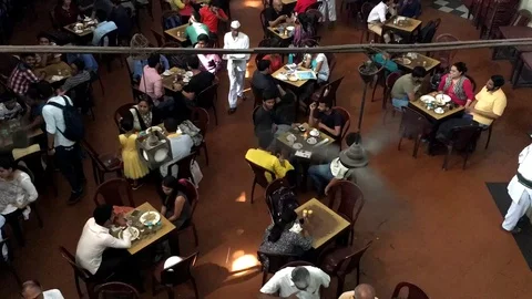 People taking lunch and making conversations inside coffee house Stock Footage 88243411