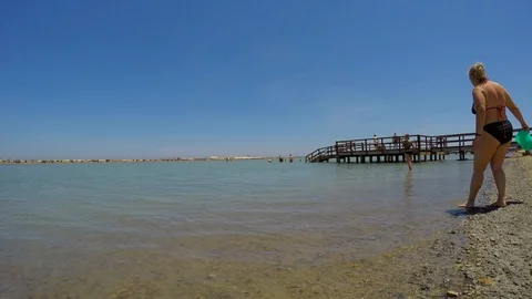 People Taking A Mud Bath Stock-Footage 86423267