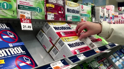 People taking Nicoderm step three for nicotine patch Stock Footage 62916695