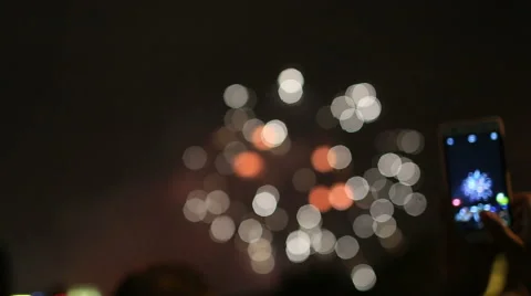 People taking photo in a firework performance show at Shanghai Stock Footage 55373820