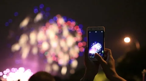 People taking photo in a firework performance show at Shanghai Stock Footage 55376128