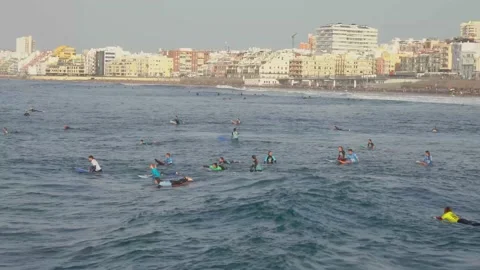 People taking surf lessons in Las Canteras beach in Las Palmas de Gran Canaria Stock Footage 168333660