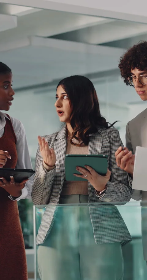 People, talk and meeting in creative agency with tablet, advice and research for Stock Footage 336792798
