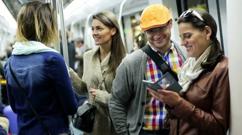 People talking and using cellphone on subway, steadycam shot. Stock Footage 36905651