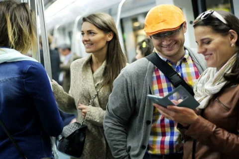 People talking and using cellphone on subway, steadycam shot. Stock-Footage 36970379