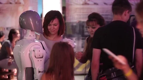 People talking with intellectual robot humanoid Stock Footage 83222369