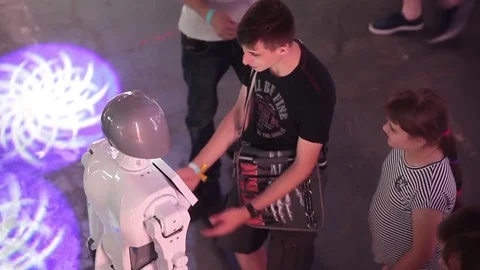 People talking with intellectual robot humanoid Stock Footage 83222399