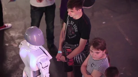 People talking with intellectual robot humanoid Stock Footage 83222401