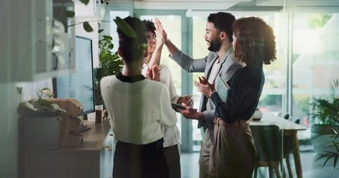 People, tech and high five in company for finance, investment success and graph 写真素材