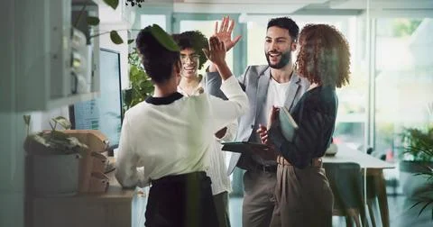 People, tech and high five in office for finance, investment success and graph 写真素材
