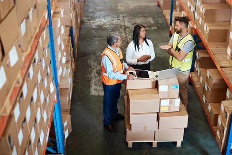 People, technology and teamwork in warehouse for logistics, supply chain an.. Stock Photos