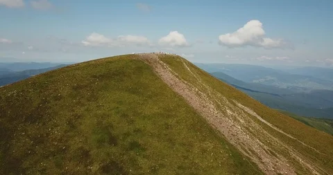 People on the top of Hoverla mountain, mountain peak at summer, aerial view Video stock 127049727