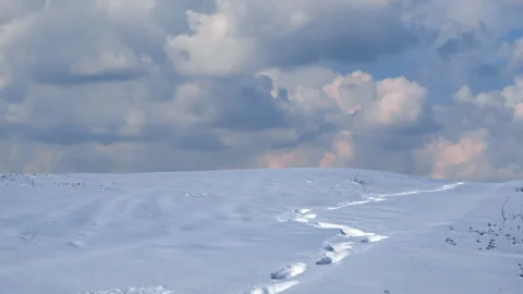 People track on a snowbound plain Video stock 152389399