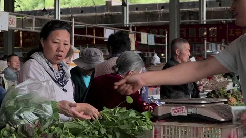 People at traditional markets in Wuhan City China Stock Footage