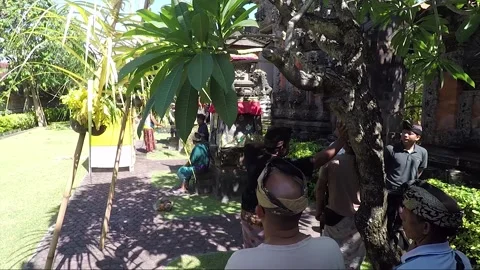 People in the Traditional Temple Outer Courtyard, Kuta, Bali, Indonesia Stock Footage 304548975