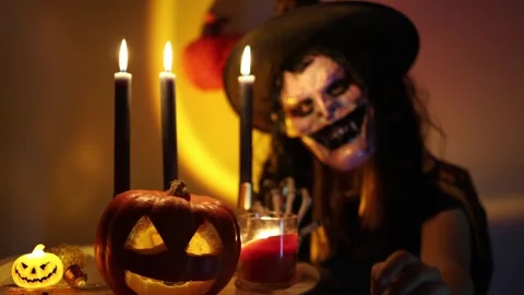People traditionally transform into frightening characters for Halloween each ye Stock Footage 346147797
