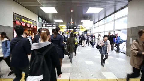 People in train station rushing work hour Stock Footage 74831240