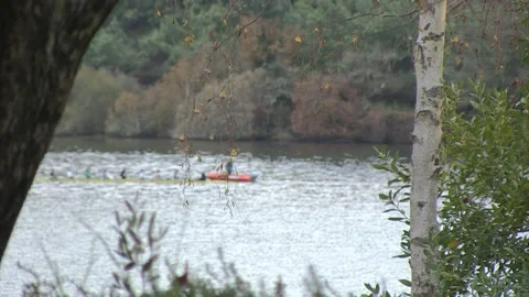 PEOPLE TRAINING REMO IN RIVER OUT OF FOCUS Stock Footage 166732108