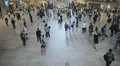 People travel crowd Grand Central Station NYC day high angle wide New York City HD Footage