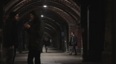 People under bridge at Berlin train station, winter night time Stock Footage 67986453