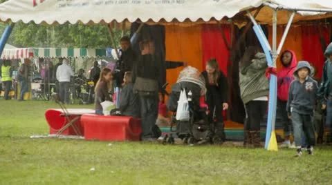 People under festival tent Stock Footage