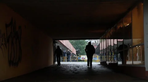 People in a underpass Stock Footage 33828653